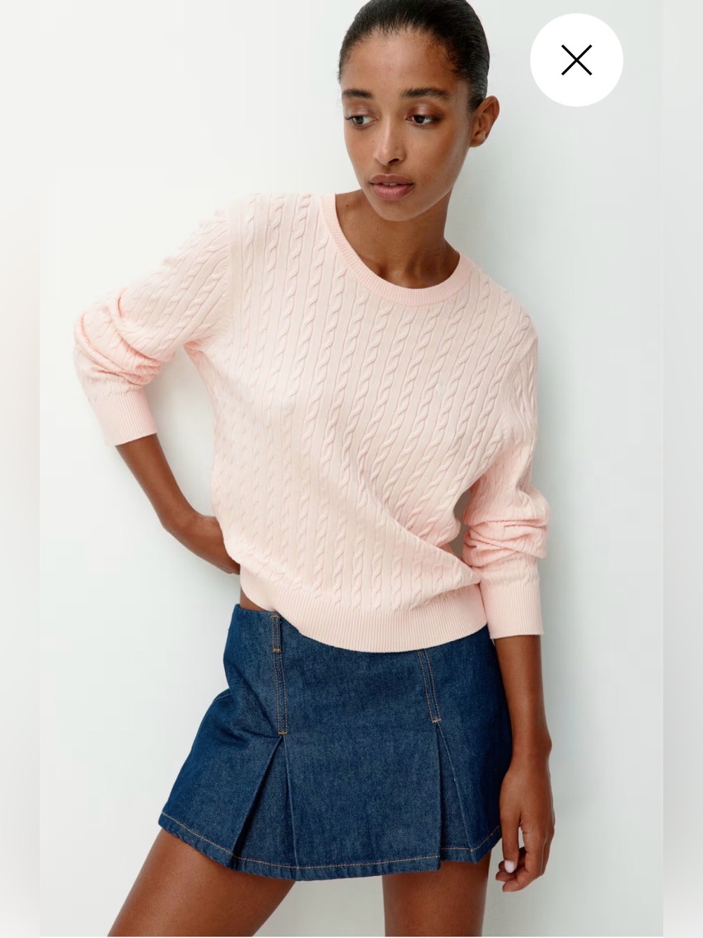 Light pink cable knit sweater with white embroidered heart. Size XS.